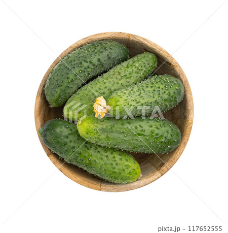 fresh cucumbers in wooden bowl fresh cucumbers in wooden bowl 117652555