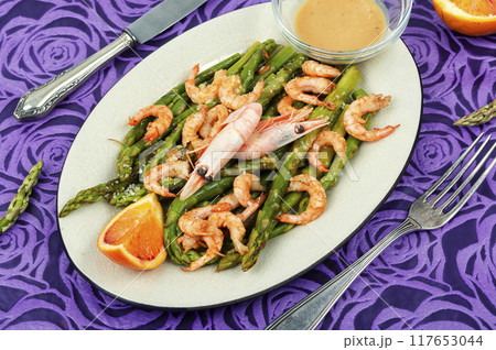 Shrimp with young boiled asparagus. 117653044