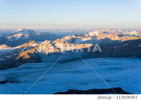mountain peaks in morning dawn light, panoramic natural landscape mountain peaks in morning dawn light, panoramic natural landscape 117656991