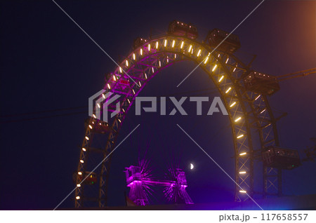 Prater amusement park, Wien - aug 2019: entrance hall and panoramic wheel Prater amusement park, Wien - aug 2019: entrance hall and panoramic wheel 117658557
