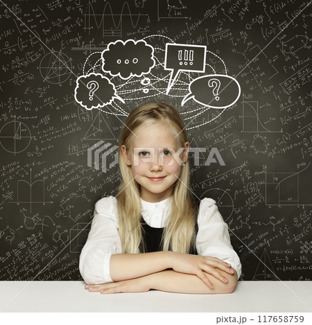 Happy child girl and thought cloud bubble with question mark above head smiling  117658759