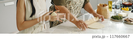 Family Baking Pie In The Kitchen 117660667