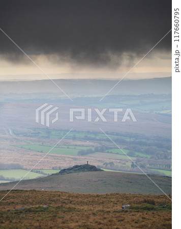 View to Brats Tor with Widgery Cross on top under storm clouds, Dartmoor UK View to Brats Tor with Widgery Cross on top under storm clouds, Dartmoor UK 117660795