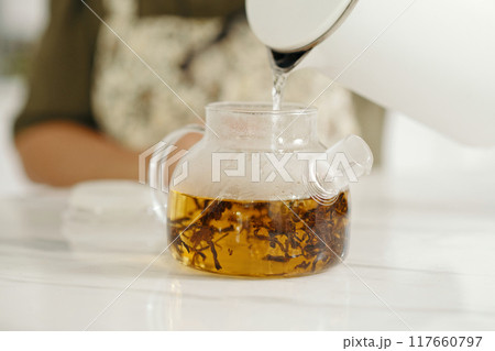 Housewife Making Black Tea For Breakfast Housewife Making Black Tea For Breakfast 117660797