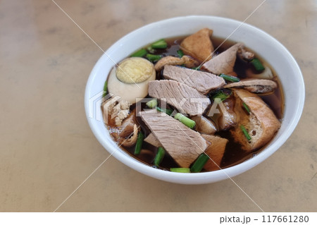 Bowl of kueh chap soup which is braised pork meat and organs, popular delicacy among the Chinese in Sarawak 117661280