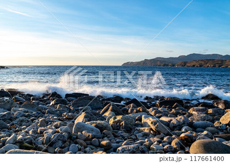 The Muckross Head pebble beach , County Donegal, reland. 117661400
