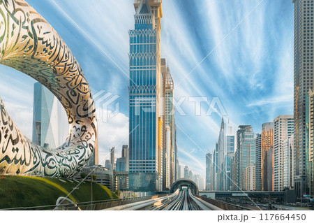 Museum Of Future. Night View. Unique Futuristic Design. Dubai, Uae. Metro Railway Among Among Glass Skyscrapers In Dubai. Traffic On Street In Dubai. Cityscape Skyline. Urban Background 117664450