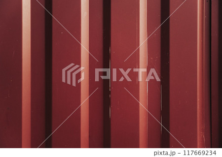 An iron, profile, red fence. Iron fence background An iron, profile, red fence. Iron fence background 117669234