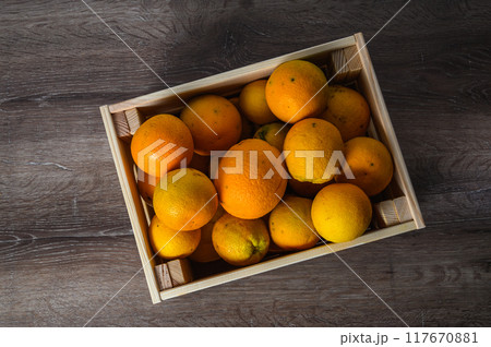 Citrus fruits in crate top view Citrus fruits in crate top view 117670881