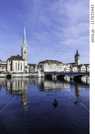 Scenic view of historic Zurich city center with famous Fraumunster and river Limmat at Lake Zurich,Switzerland 117672443