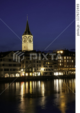 sunset scenic view of historic Zurich city center with famous Fraumunster and river Limmat at Lake Zurich,Switzerland 117672449