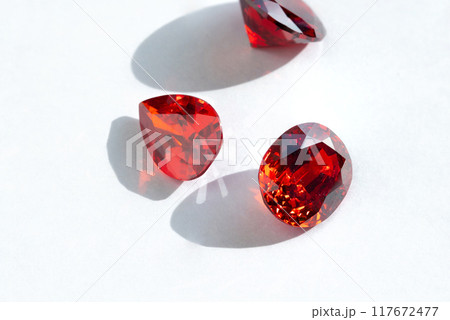 Red Ruby gemstone isolate on white background, close up shot 117672477
