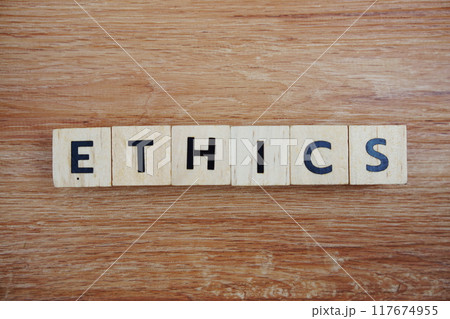 ETHICS alphabet letters top view on wooden background 117674955
