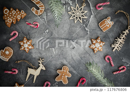 Christmas celebration with decoration and homemade ginger cookies. Flat lay, top view. 117676806