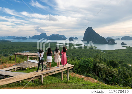 Asian young female friends enjoy view of Phangnga bay, Thailand 117678439