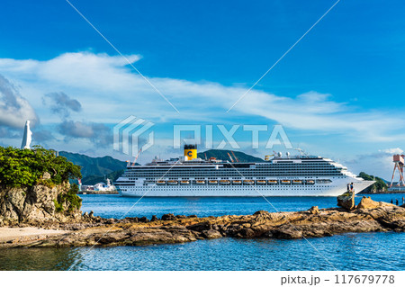 長崎港客船出港　神の島からコスタ・セレーナと岬のマリア像【長崎市】 117679778