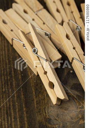 a group of wooden clothespins for drying clothes a group of wooden clothespins for drying clothes 117680860