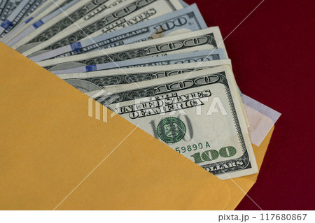 new yellow paper envelopes with American dollars new yellow paper envelopes with American dollars 117680867