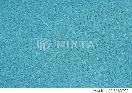 Texture of genuine leather or artificial synthetic leatherette turquoise color background 117683709
