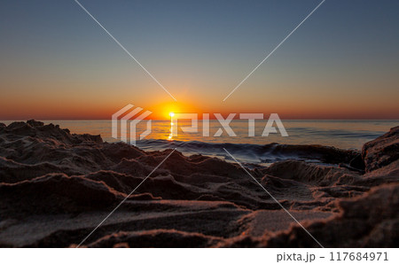 Seascape. Waves and surf. Sunset and dawn at sea. Calm 117684971