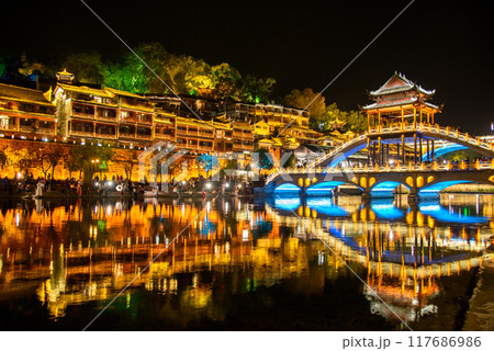 Fenghuang Ancient Town. Located in Fenghuang County. Southwest of HuNan Province, China. Fenghuang is a popular tourist destination of Asia. 117686986