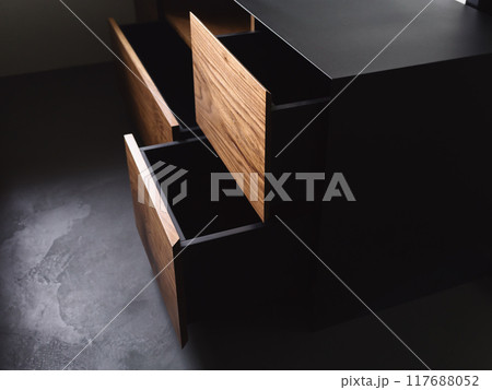 Closeup details of modern tv stand made from walnut and powder coated steed 117688052