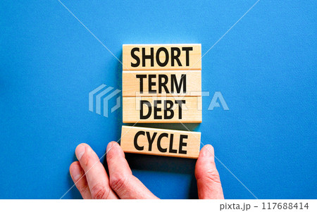 Short term debt cycle symbol. Concept words Short term debt cycle on beautiful wooden block. Beautiful blue table background. Businessman hand. Business Short term debt cycle concept. Copy space. Short term debt cycle symbol. Concept words Short term debt cycle on beautiful wooden block. Beautiful blue table background. Businessman hand. Business Short term debt cycle concept. Copy space. 117688414