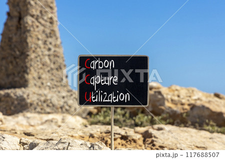 CCU Carbon capture utilization symbol. Concept words CCU Carbon capture utilization on beautiful blackboard Beautiful stone background Business ecological Carbon capture utilization concept Copy space 117688507