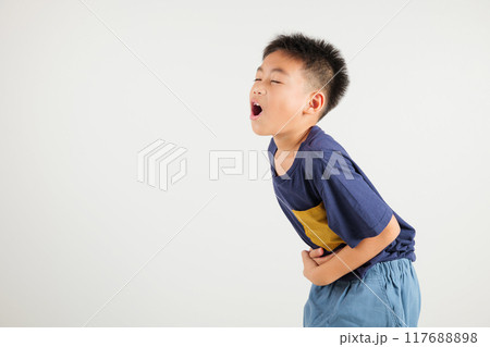 Portrait of Asian young kid boy has stomachache, primary child abdominal pain suffering from stomach ache, studio shot isolated on white background, food poisoning, Health and medical gastritis 117688898