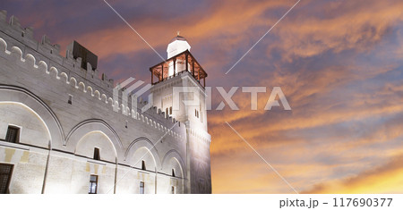 King Hussein Bin Talal mosque in Amman (at night), Jordan.  Against the background of a beautiful sky with clouds 117690377