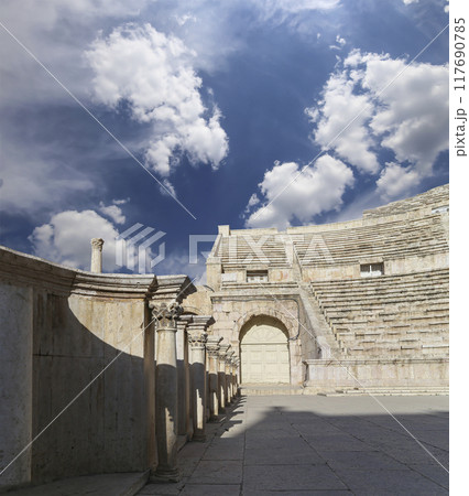 Roman Theatre in Amman, Jordan -- theatre was built the reign of Antonius Pius (138-161 CE), the large and steeply raked structure could seat about 6000 people. Against the sky with clouds Roman Theatre in Amman, Jordan -- theatre was built the reign of Antonius Pius (138-161 CE), the large and steeply raked structure could seat about 6000 people. Against the sky with clouds 117690785