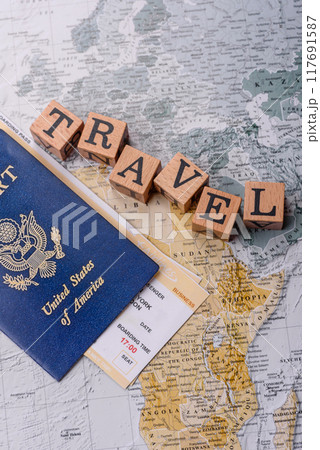 Conceptual background for travel with passport, magnifying glass, world map and money 117691587