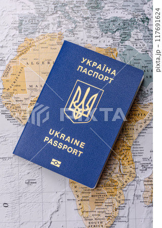 Conceptual background for travel with passport, magnifying glass, world map and money 117691624