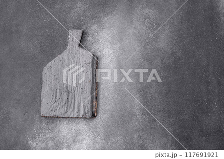 Empty wooden cutting board. Kitchen utensils Empty wooden cutting board. Kitchen utensils 117691921