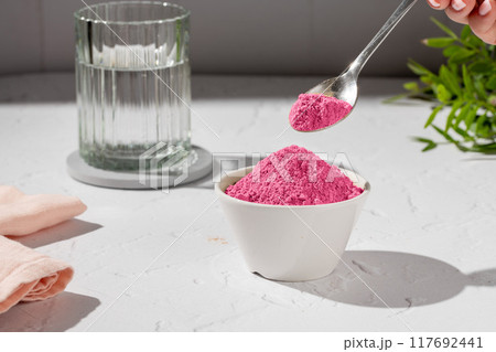 Collagen protein powder drink. Glass of collagen beauty drink. Food supplement. 117692441