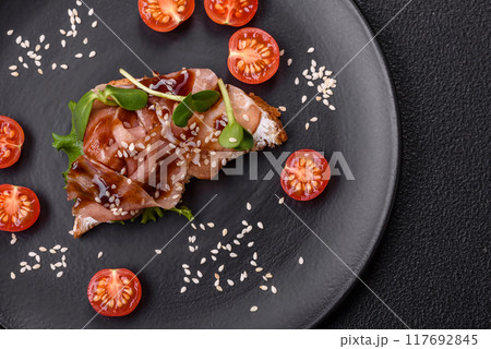 Variation of several toasts or bruschetta with prosciutto, mushrooms and veal 117692845