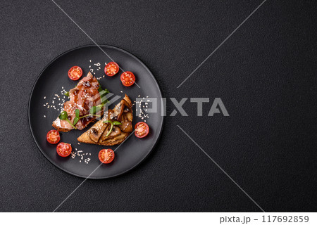 Variation of several toasts or bruschetta with prosciutto, mushrooms and veal Variation of several toasts or bruschetta with prosciutto, mushrooms and veal 117692859