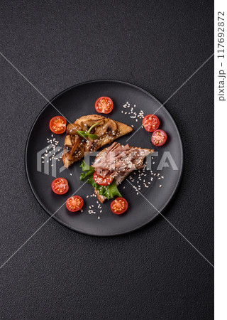 Variation of several toasts or bruschetta with prosciutto, mushrooms and veal Variation of several toasts or bruschetta with prosciutto, mushrooms and veal 117692872