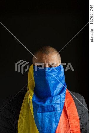 Hooded fighting for freedom, resistance for democracy in Venezuela, violation of human rights 117694744