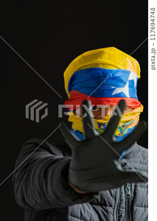 Hand as a symbol of stopping dictatorship, violation of human rights in venezuela 117694748