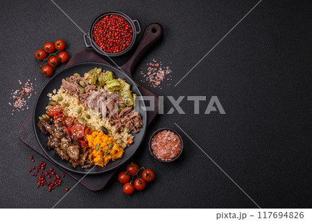 Bowl of food with beef, bulgur, tomatoes, mushrooms, zucchini Bowl of food with beef, bulgur, tomatoes, mushrooms, zucchini 117694826