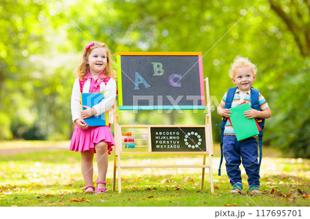 Children happy to be back to school Children happy to be back to school 117695701