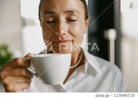 Joyful Moments Savoring and Truly Enjoying a Perfect Cup of Delicious Coffee Each Day Joyful Moments Savoring and Truly Enjoying a Perfect Cup of Delicious Coffee Each Day 117696719