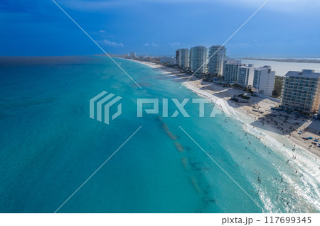 Turquoise Waves at Sunset 117699345