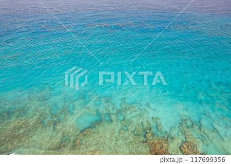 Sunset Horizon Over the Mexican Caribbean Sea Captured by Drone Sunset Horizon Over the Mexican Caribbean Sea Captured by Drone 117699356