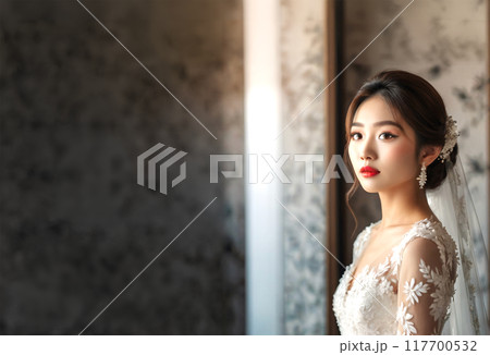 アンティークな壁紙とウェディングドレスを着た花嫁 117700532