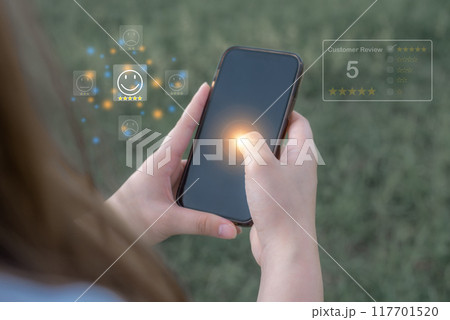 Excellence Review, Hand young woman Uses, Holding, smartphone mobile with five star to review 117701520