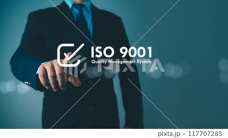 ISO 9001 Standard certification standardisation quality control concept. Businessman point your finger at text ISO 9001 for quality management of organizations, Certified and quality. 117707283