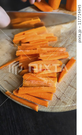 Carrot slices for cooking. Home cooking concept. Suitable for pilaf and stew. 117714945