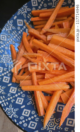 Carrot slices for cooking. Home cooking concept. Suitable for pilaf and stew. 117714946